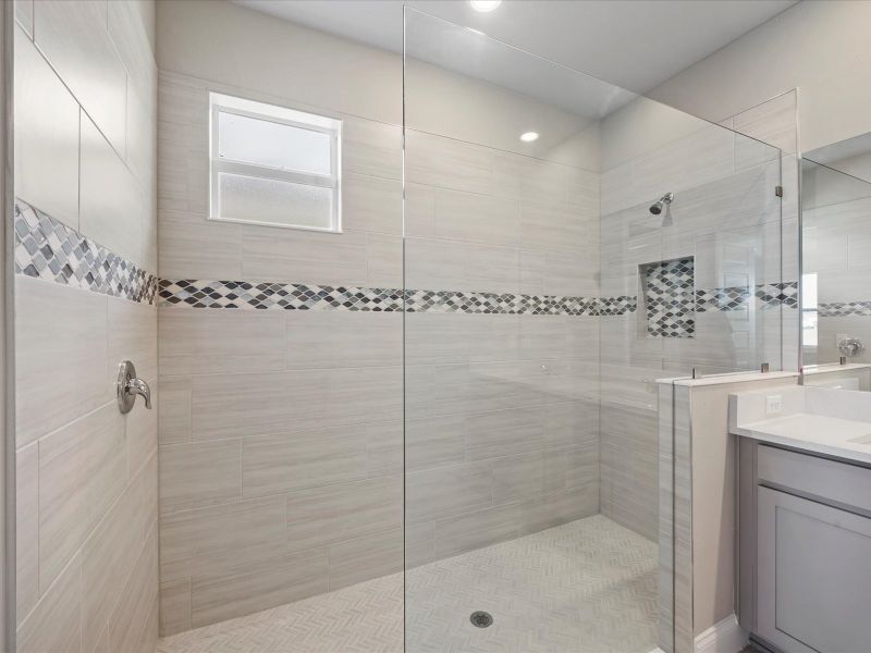 Primary Bathroom in the Coral floorplan at 6326 NW Sweetwood Drive in Brystol at Wylder