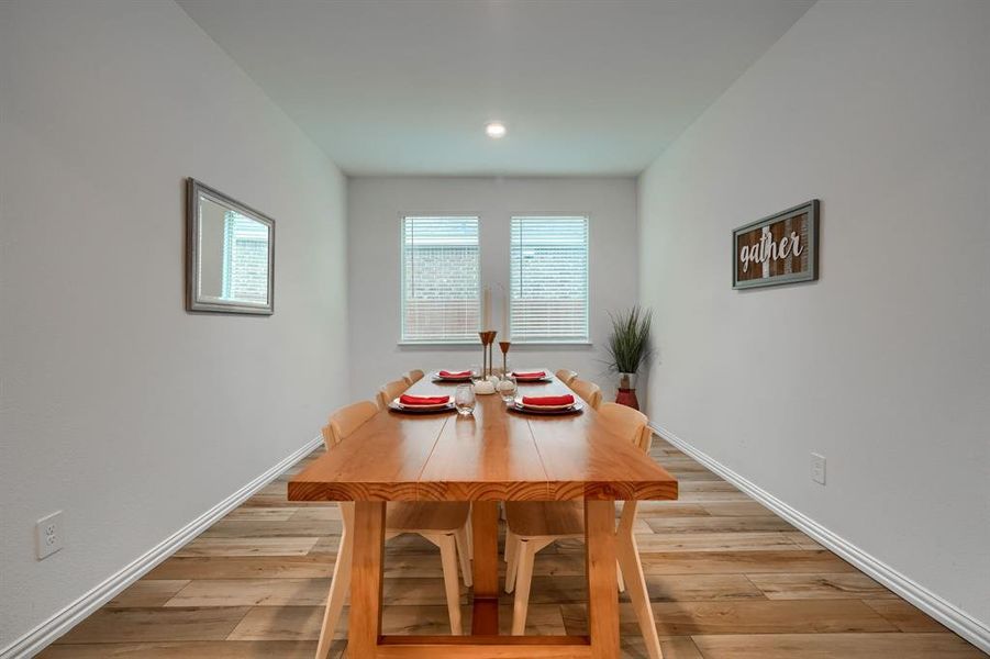 Dining area featuring light hardwood / wood-style floors