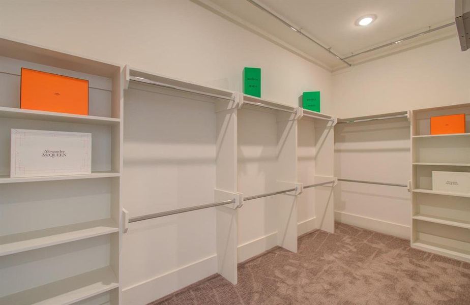 Large primary closets offers space to accommodate your clothing.