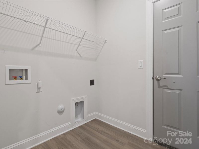 laundry room connected to garage