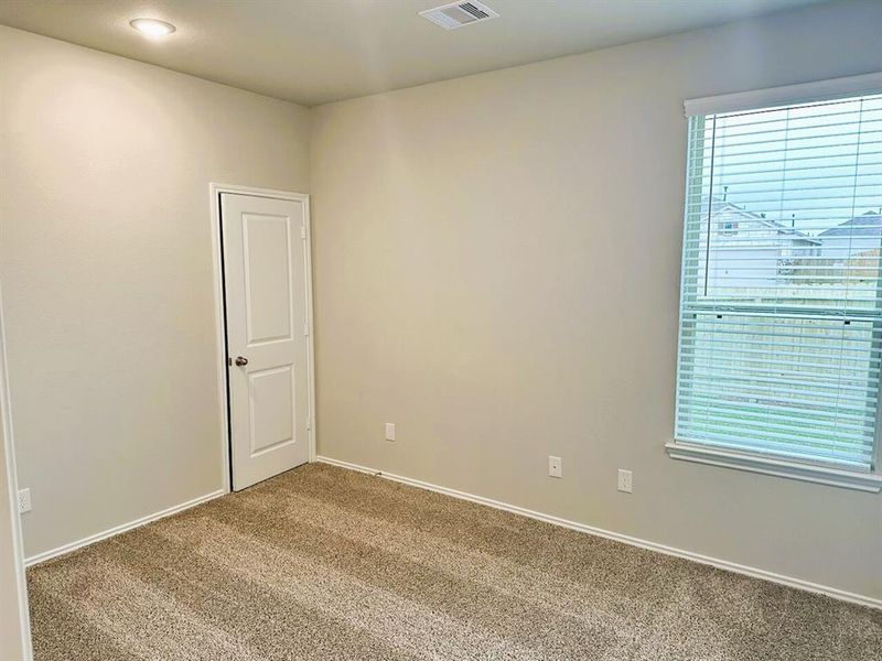 Bedroom 2 is roomy & has a walk in closet