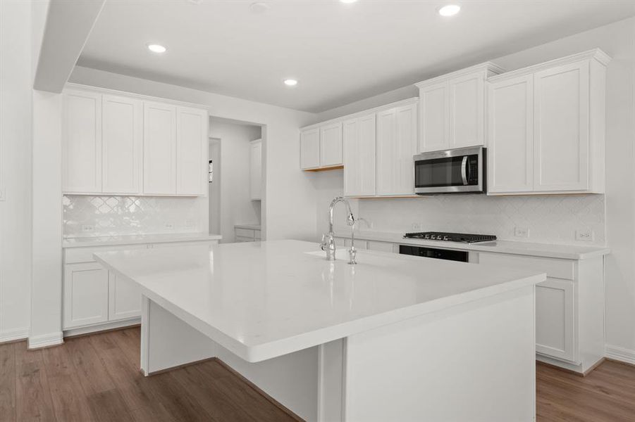 This kitchen is not only a functional space but also has ample storage. Whether you're a seasoned chef or just love to gather and enjoy good food, this kitchen is a dream come true.