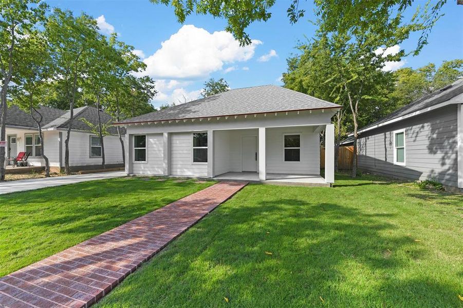 View of front of home with a front yard