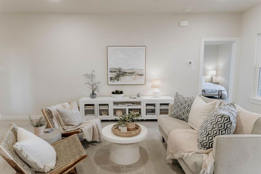 Living room featuring carpet floors