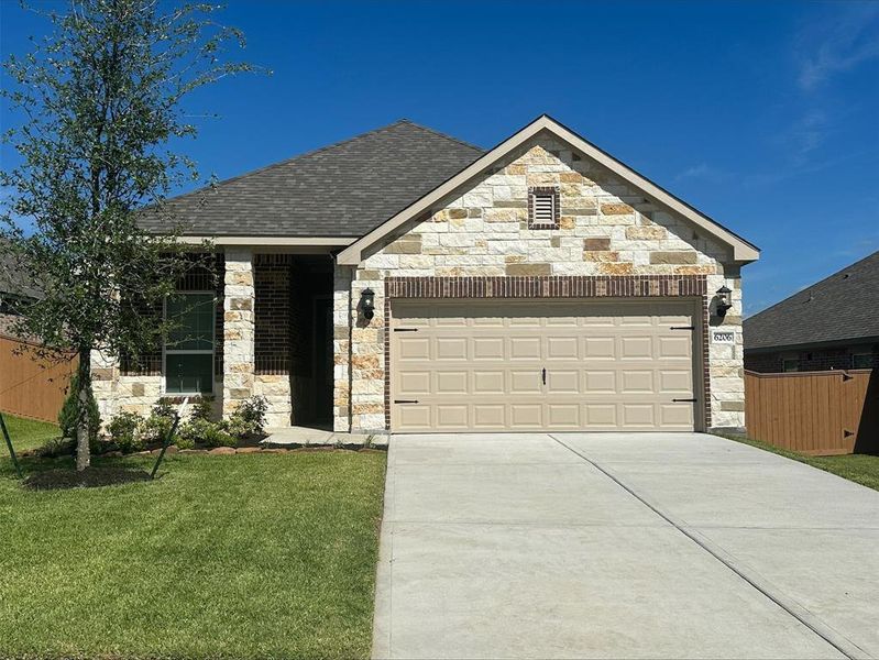 The Alder is a beautiful floorplan with a unique design combination of stone and brick.