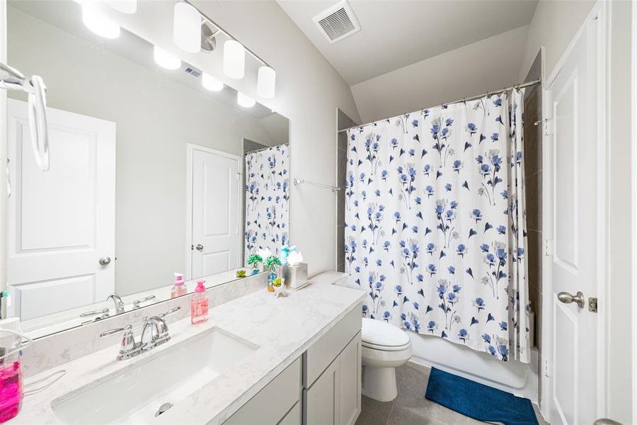 Secondary bathroom upstairs.