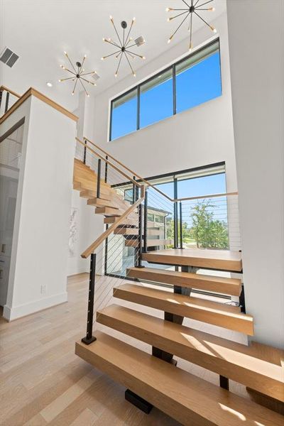 Stunning floating staircase is sure to impress.