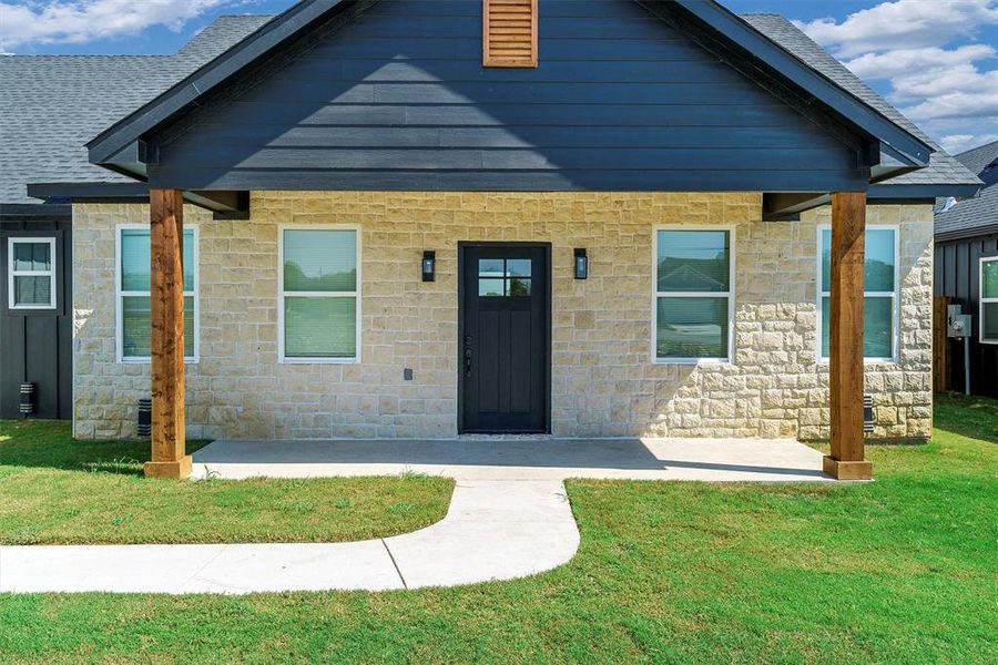 View of front of home with a front yard