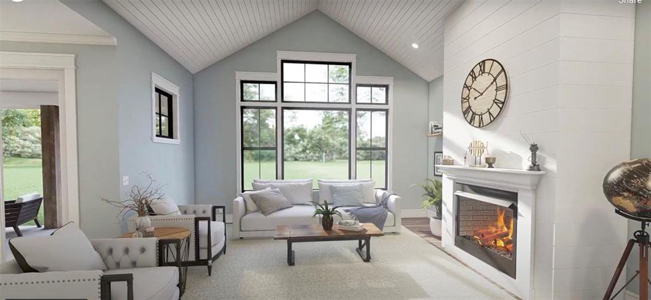 Vaulted ceilings with large windows for all that natural light to shine through your new home!