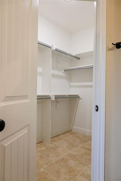 Spacious walk-in closet in Primary Bathroom.