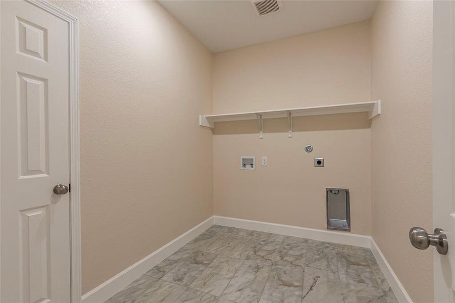 large laundry room with closet