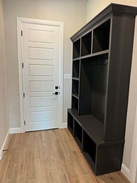 Mudroom featuring hardwood / wood-style flooring