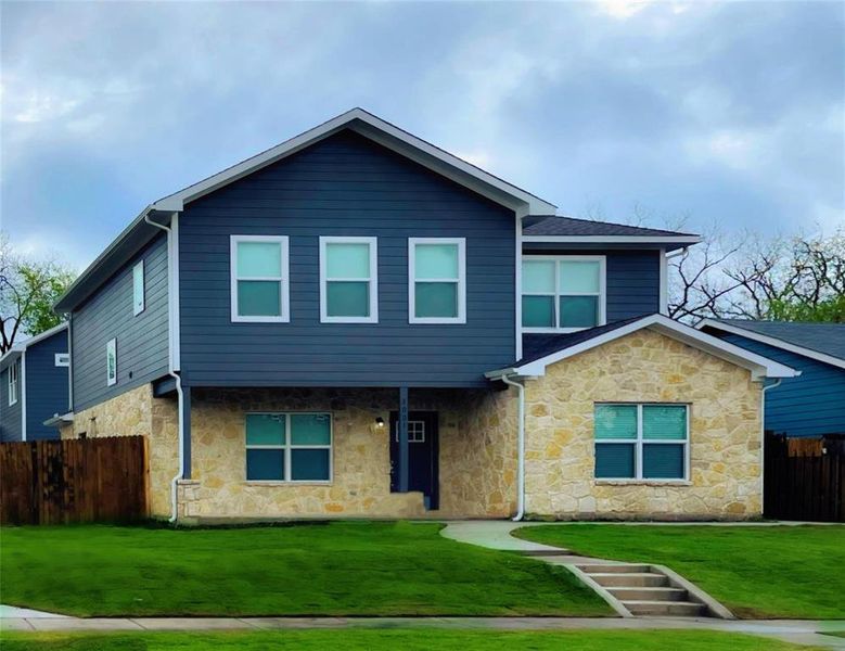 View of front of home with a front lawn