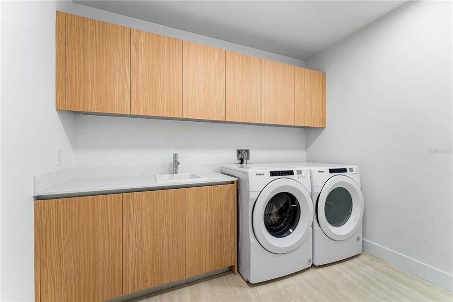 Laundry room with door