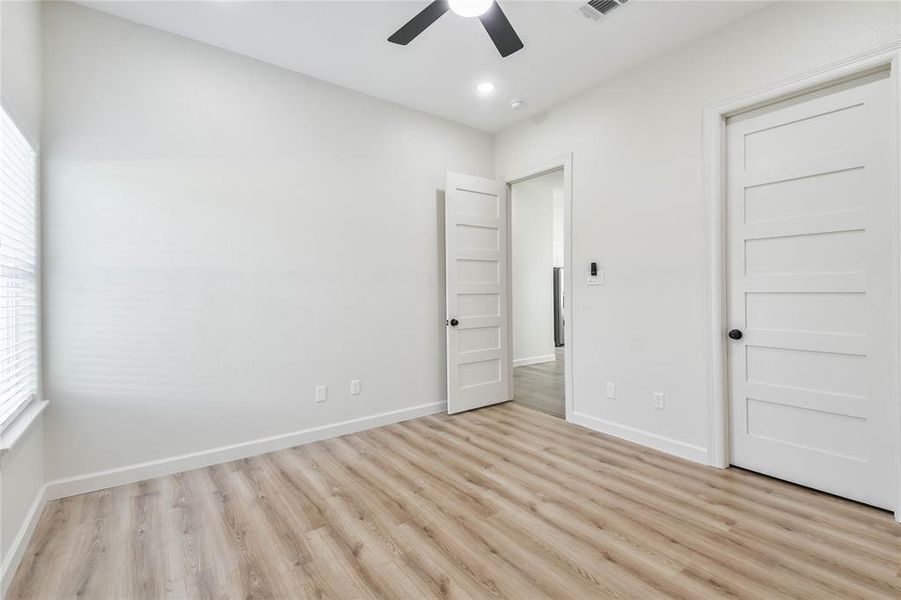 Large closet and note the quality of the doors--all upgraded solid wood 8 ft panel doors.