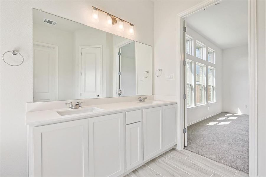 Bathroom featuring vanity