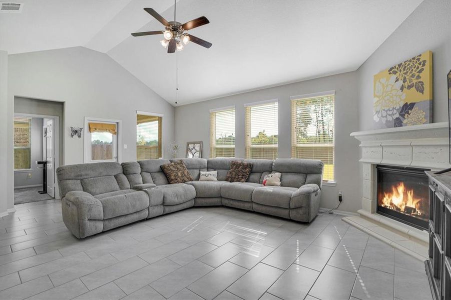 Cozy family room with elegant fireplace.