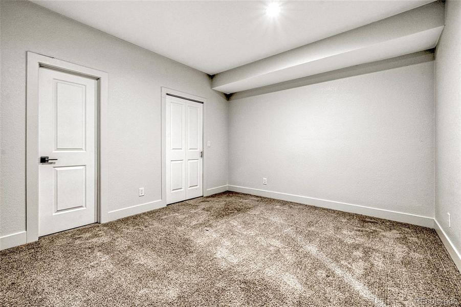 A fourth bedroom is found in the basement and offers plush carpet flooring, a walk in closet and easy access to anywhere, including a bathroom.