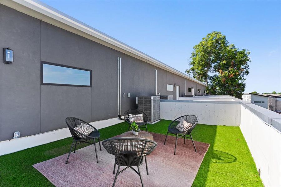 View of patio featuring central AC unit