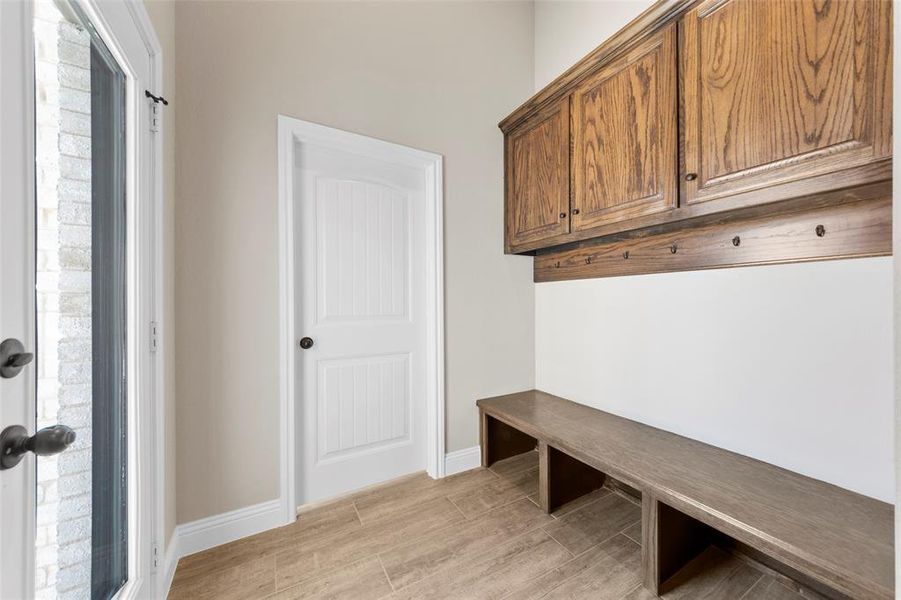 Mudroom featuring light wood-type flooring