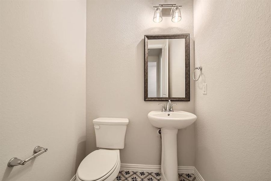 Bathroom featuring toilet and sink