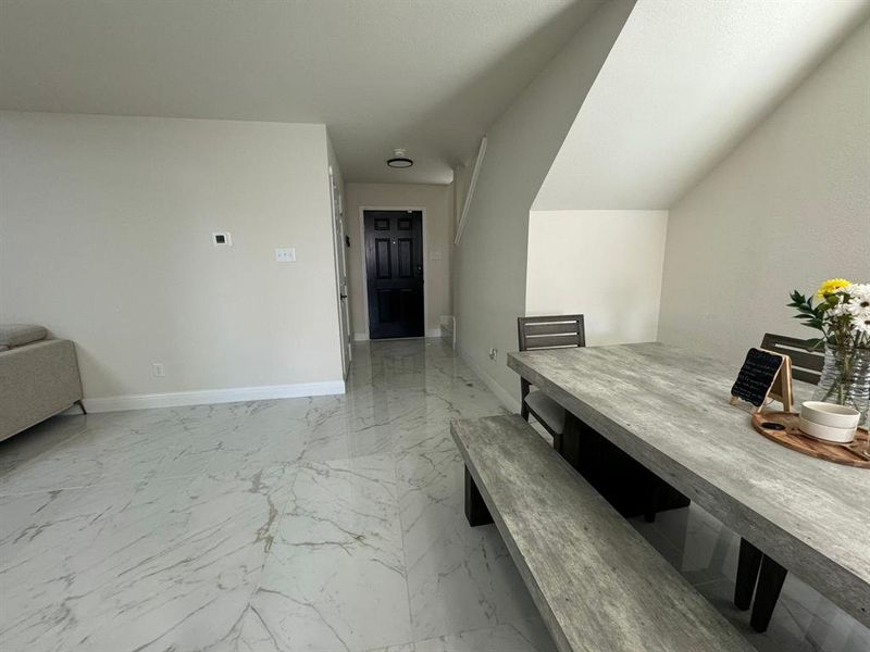 Dining room with tile flooring