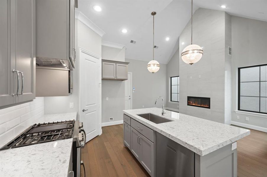 Any chef's dream, this stunning kitchen is perfect for everyday life as well as entertaining family and friends! Large kitchen island is perfect for conversation pr that much needed space to lay out your party treats for everyone to enjoy