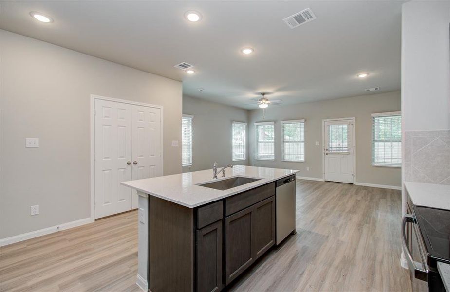 Open concept kitchen/dining/family room located on first floor