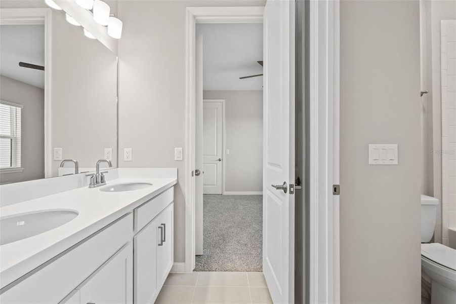 Jack and Jill bath leading into Bedroom 3