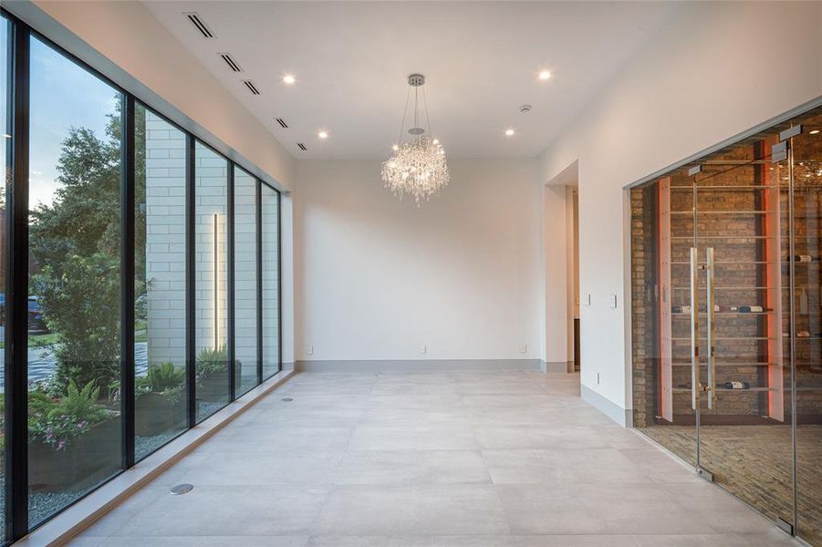 Entertain in this elegant formal dining room surrounded by your spectacular wine collection in the temperature controlled wine cellar.  #winelovers