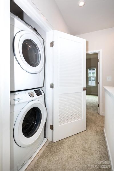 Stacked Samsung washer/dryer conveys with purchase.