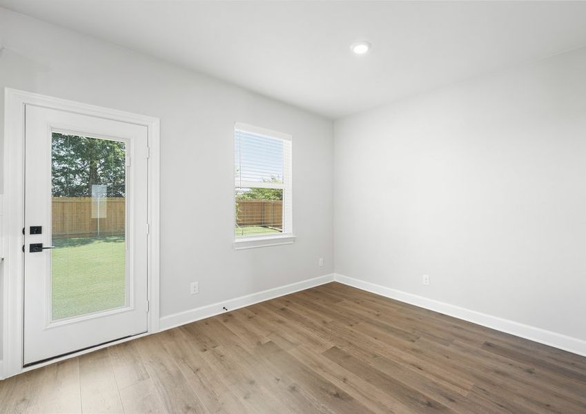 The dining room of the Reed floor plan has a large window that lets in great, natural light.