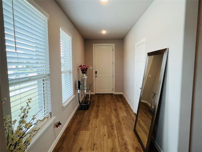 Hall featuring hardwood / wood-style floors