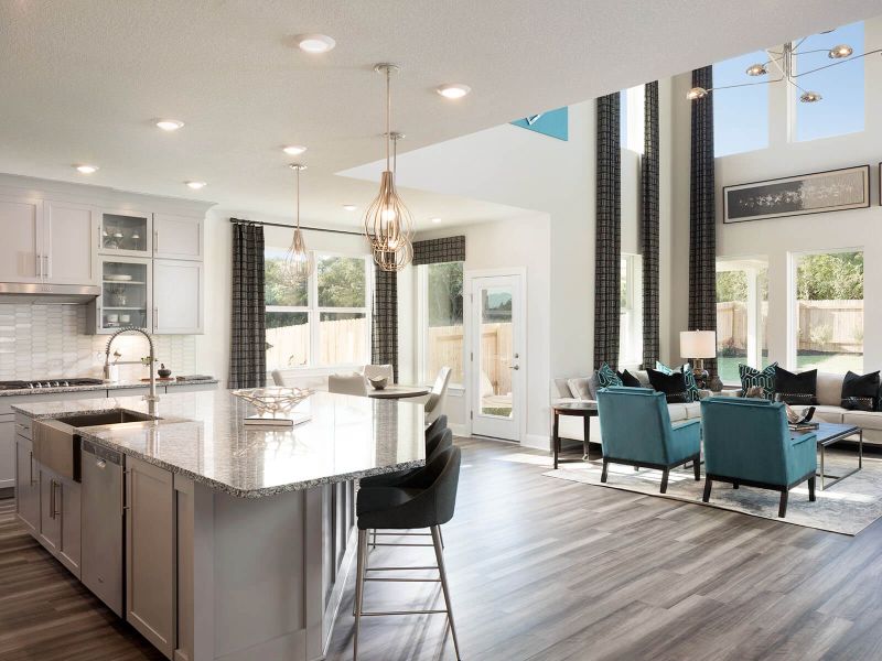 The open kitchen, dining area and great room make this home spacious and functional.