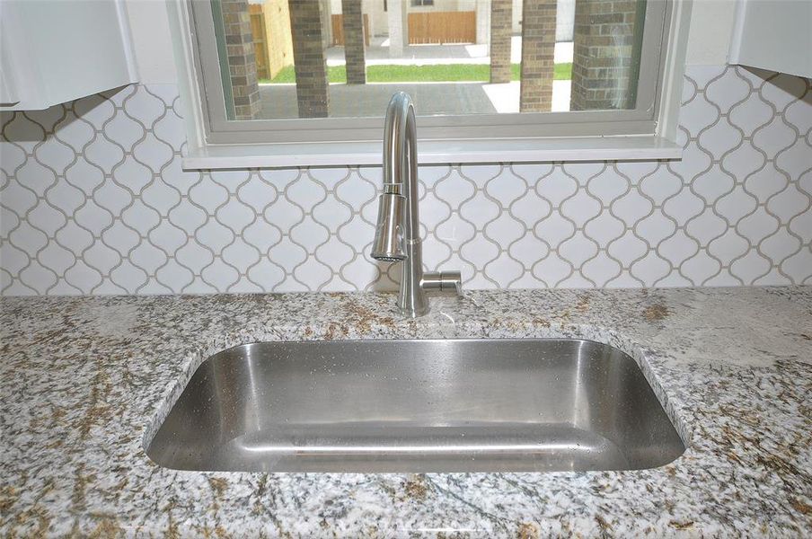 Single Bowl Stainless undercounted sink.