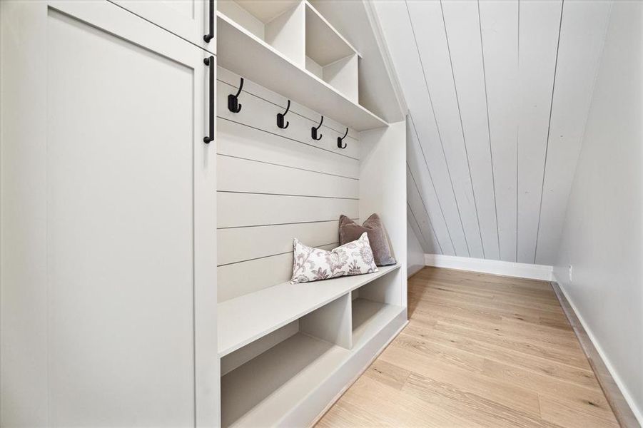 Conveniently situated right inside the door leading in from the 2-car oversized garage, the mudroom serves as the perfect drop zone to help the rest of the house remain organized and clutter free.