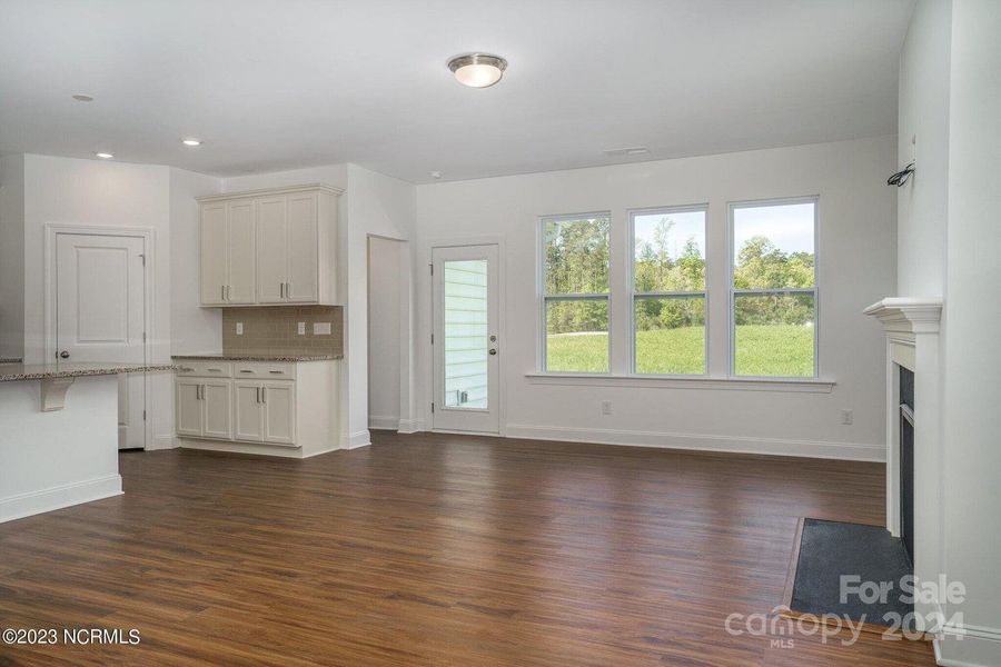 Concept Photo of Great Room with gas fireplace!