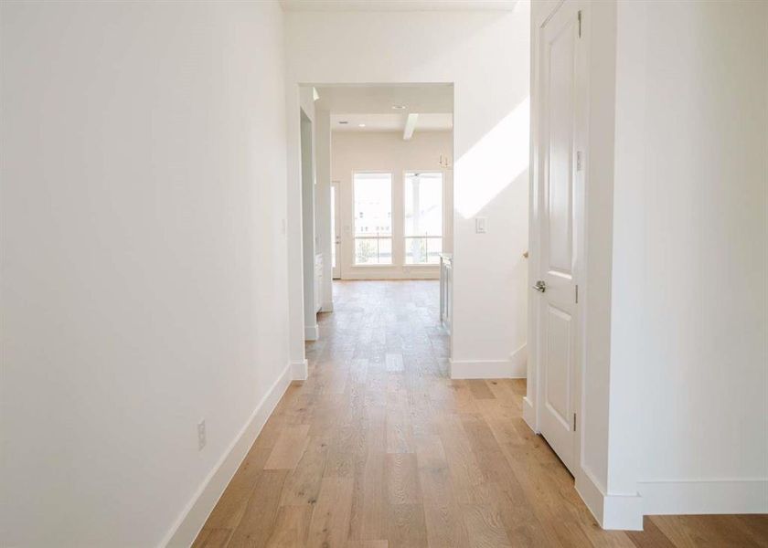 Hall featuring light hardwood / wood-style floors