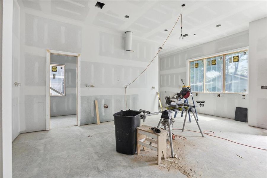 An amazing kitchen and huge pantry with a window awaits!  Extensive, site-built cabinetry with soft close cabinets and drawers, a full Thermador appliance package including built-in coffee machine, pot-filler, under cabinet lighting, expansive island, designer fixtures and hardware coming soon!  Photo as of 9/3/2024