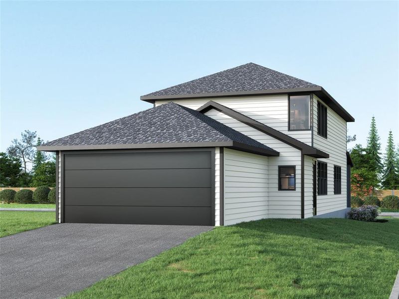 View of side of property featuring a yard and a garage