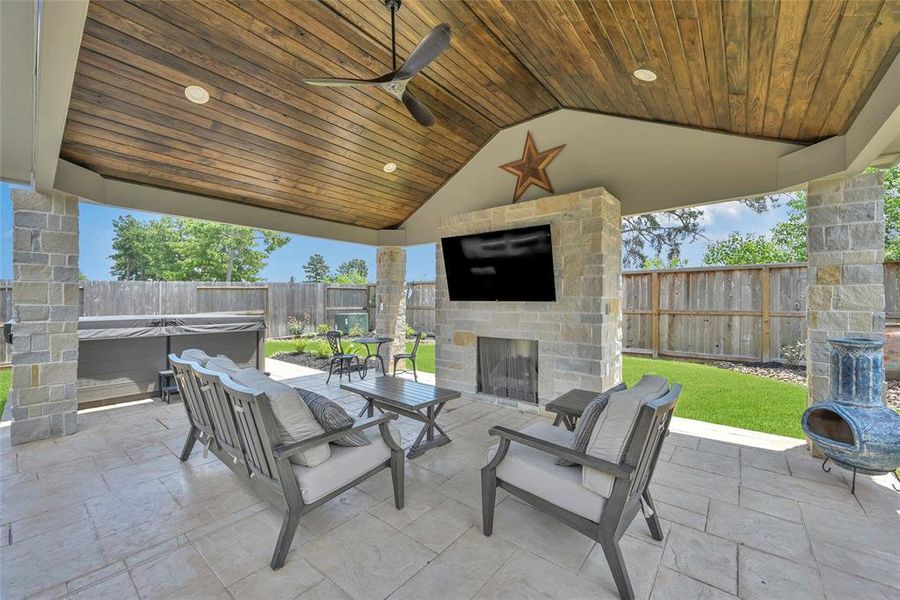 The backyard retreat of your dreams awaits! Your new backyard pavilion boasts a wood planked ceiling and comes complete with a gas fireplace, large screen television, and an 8 person hottub.  This is the back yard dreams are made of!