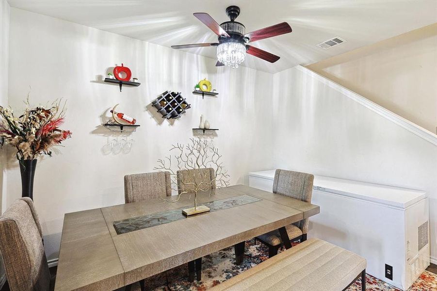 Dining space with ceiling fan