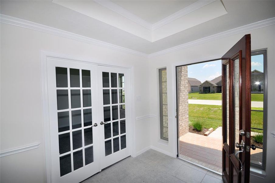 Study behind French Doors off the foyer.