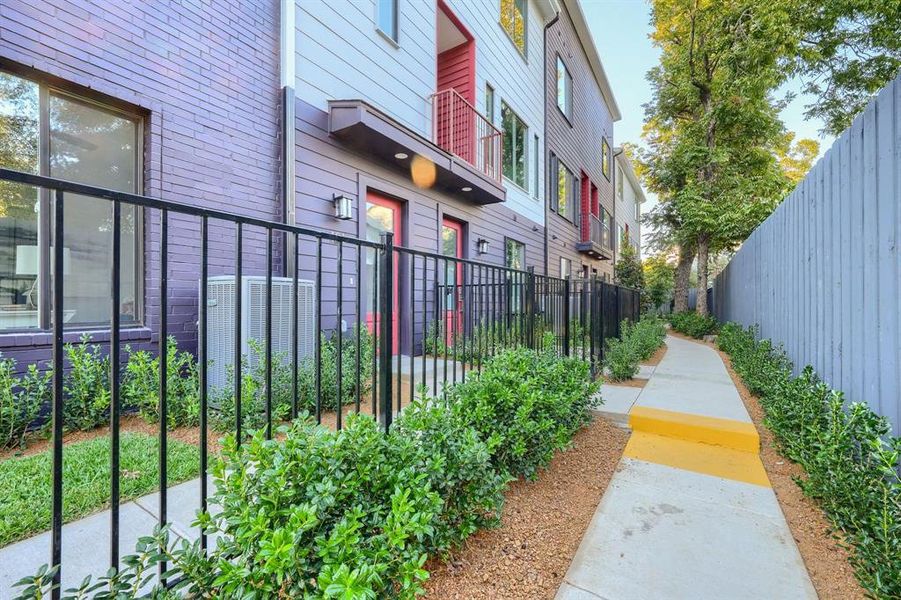 Gated and landscaped walkup.