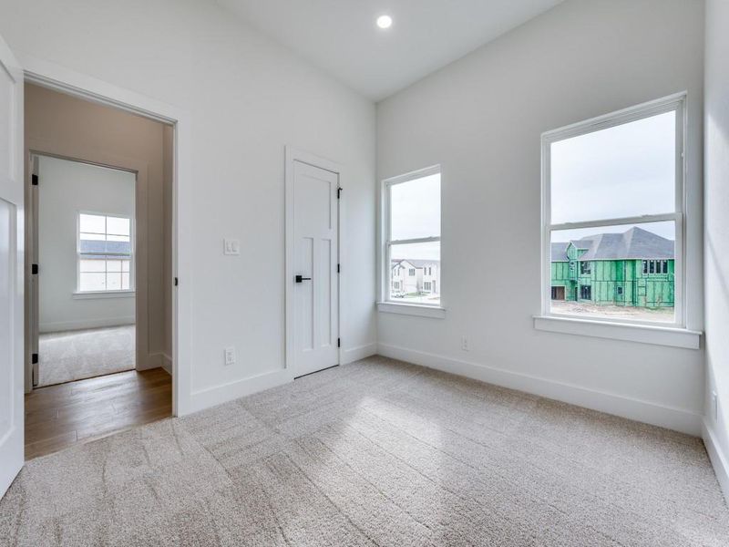 Empty room featuring hardwood / wood-style flooring