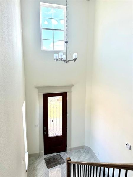 Entrance foyer with a chandelier