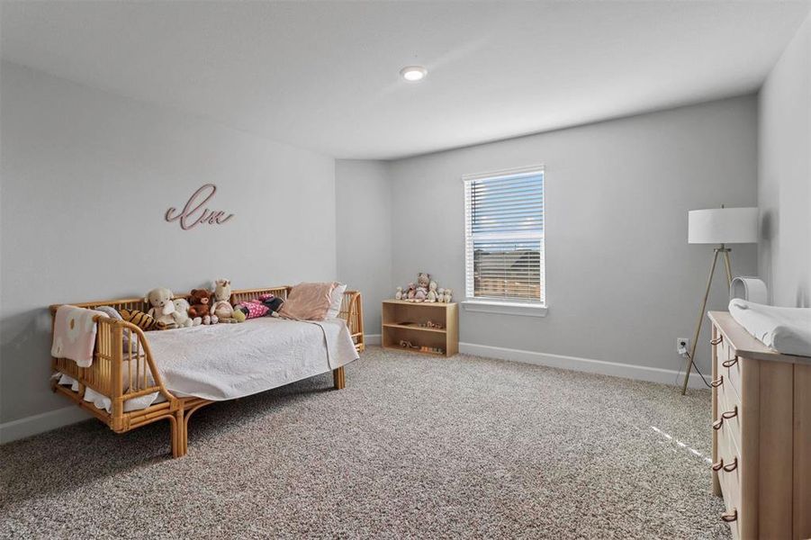 Bedroom featuring carpet floors