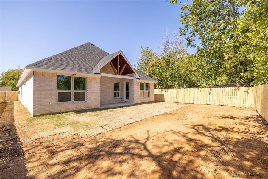 Back of property with a patio area