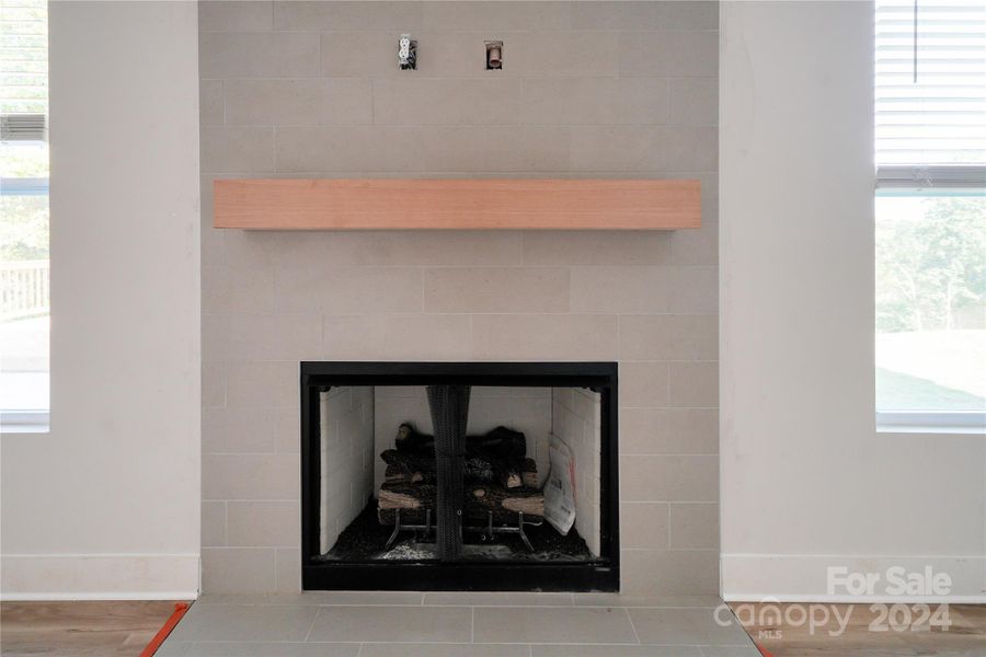 Ceramic Tile Fireplace with cedar beam