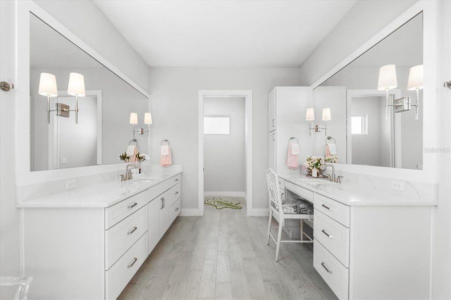 Dual vanity's in primary bathroom with separate water closet.